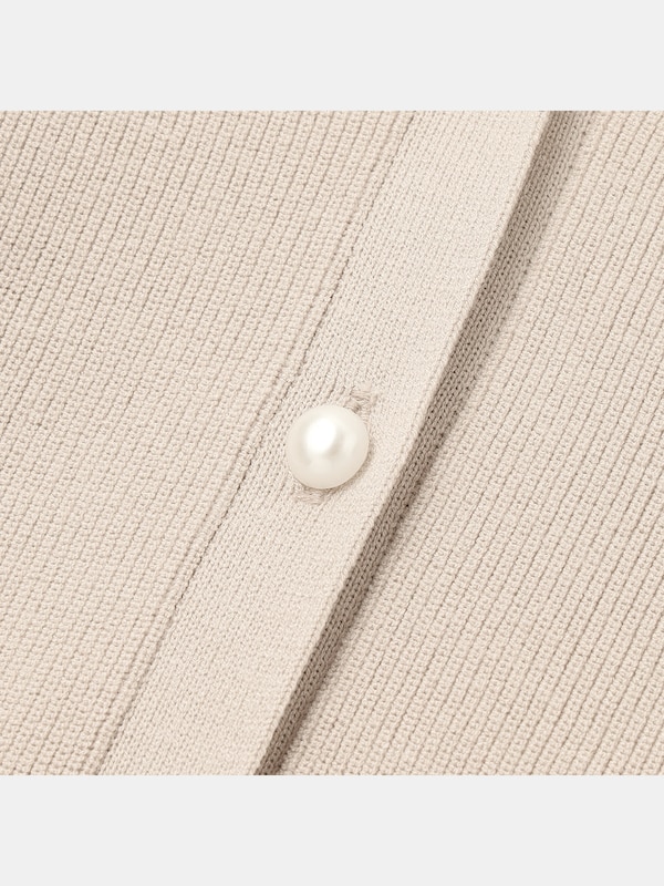 Vネックパールボタンペプラムカーディガン（長袖）