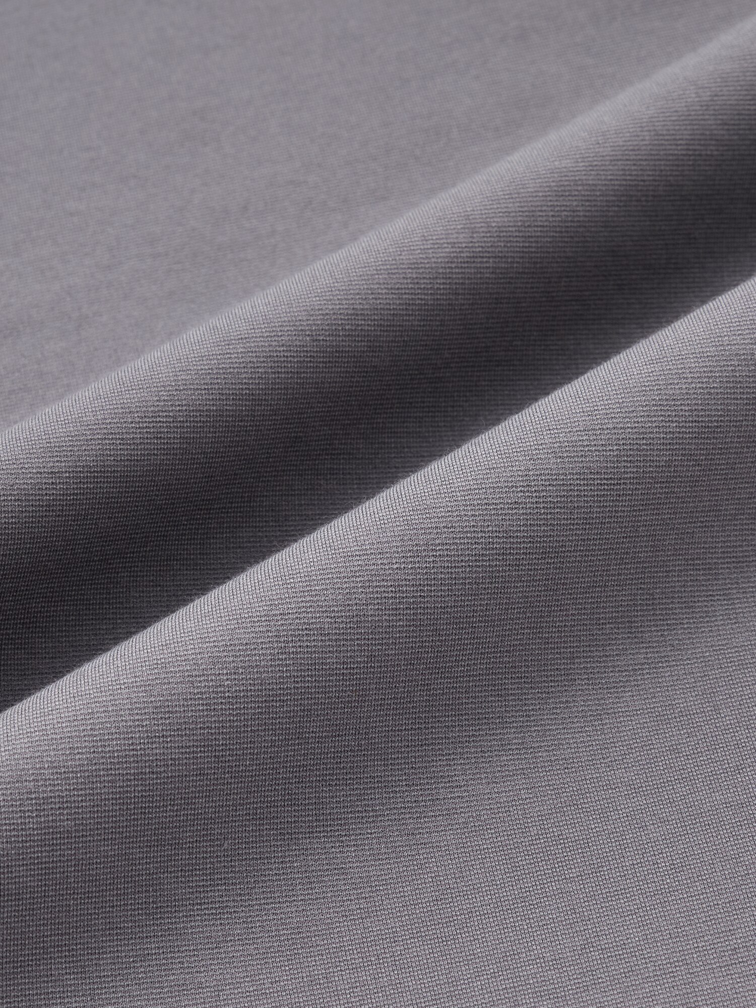 ストレッチコットンブレンドラウンドテールTシャツ